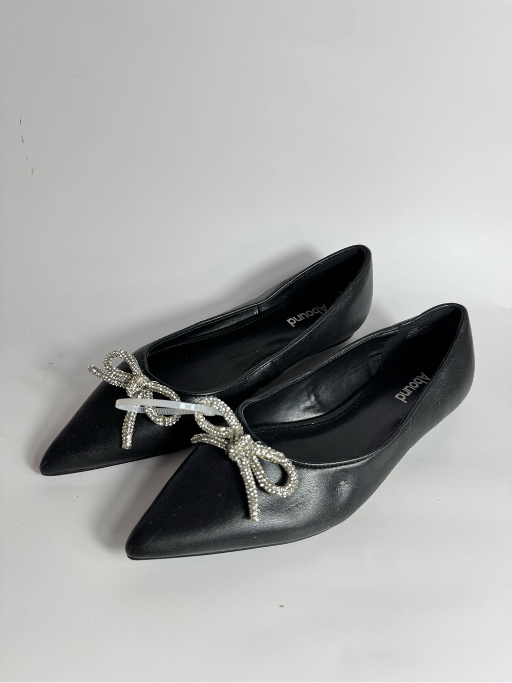 Abound Black Pointed Toe Flats with Crystal Bow Accent